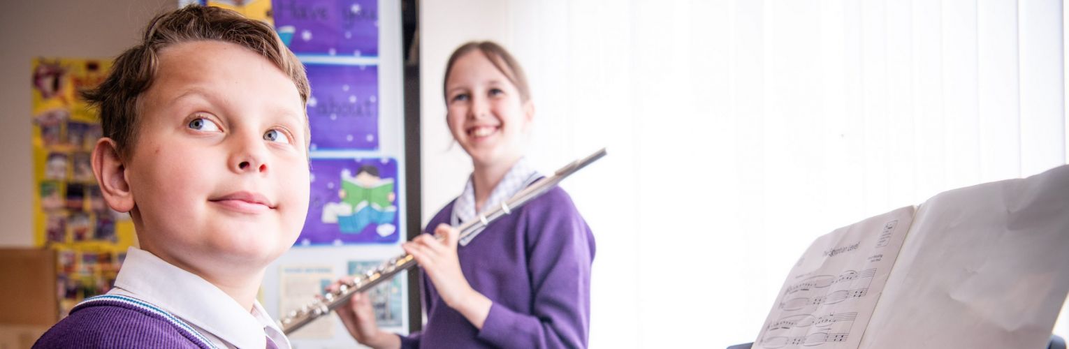Students playing instruments