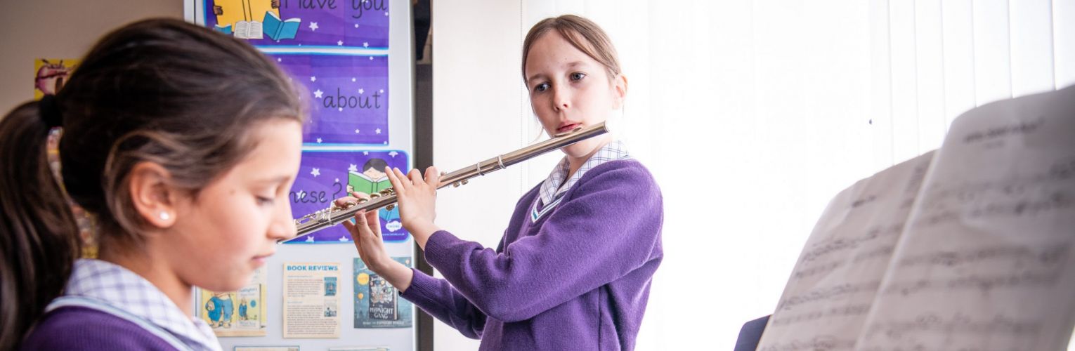 Girls playing instruments