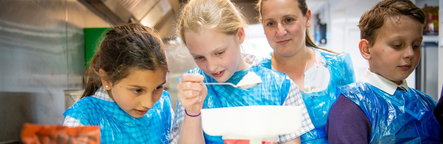 Students measuring out ingredients